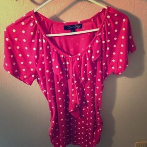 Pink polka dot blouse with ruffles